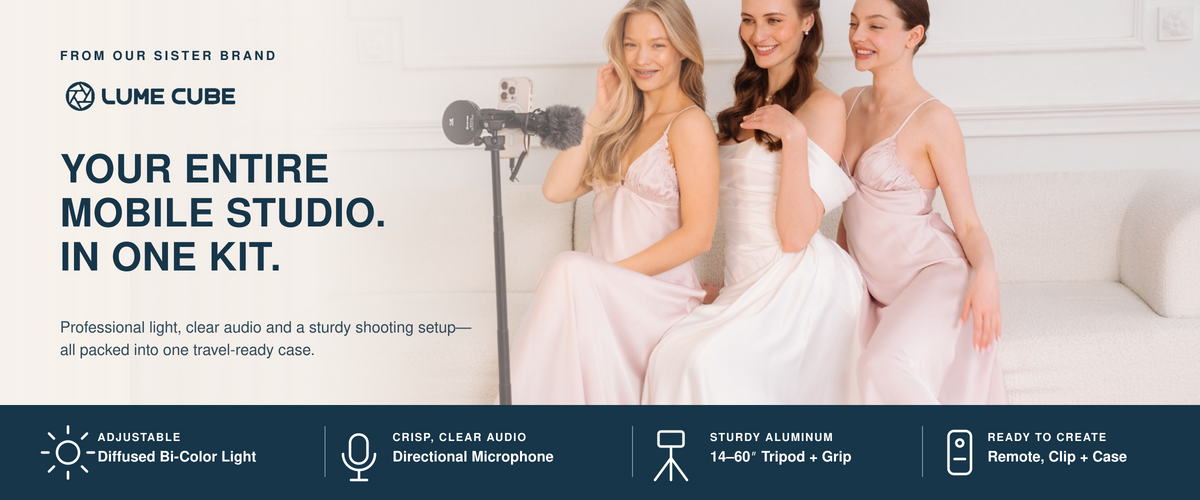 Promotional banner for the Lume Cube, showing three women in a bright white studio setting with the product components visible: a tripod, diffused light, and directional microphone. The top text reads 'FROM OUR SISTER BRAND LUME CUBE' and the main headline says 'YOUR ENTIRE MOBILE STUDIO.